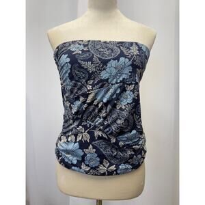 Free people, not sure if it’s a top or skirt. Size Small-M 
Waist-15 length-15